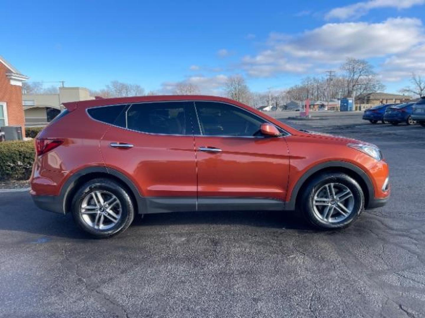 2017 Canyon Copper Hyundai Santa Fe Sport 2.4 FWD (5XYZT3LB8HG) with an 2.4L L4 DOHC 16V engine, 6-Speed Automatic transmission, located at 1230 East Main St, Xenia, OH, 45385, (937) 908-9800, 39.688026, -83.910172 - Photo#3