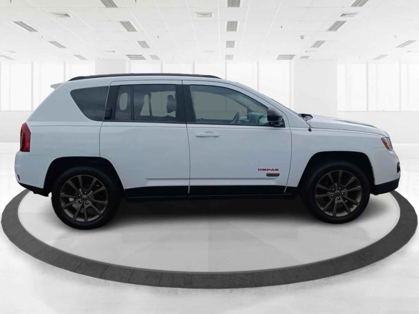 2017 White Knuckle Clear Coat Jeep Compass (1C4NJCBB4HD) with an 2.4L L4 DOHC 16V engine, located at 1184 Kauffman Ave, Fairborn, OH, 45324, (937) 908-9800, 39.807072, -84.030914 - Photo#1