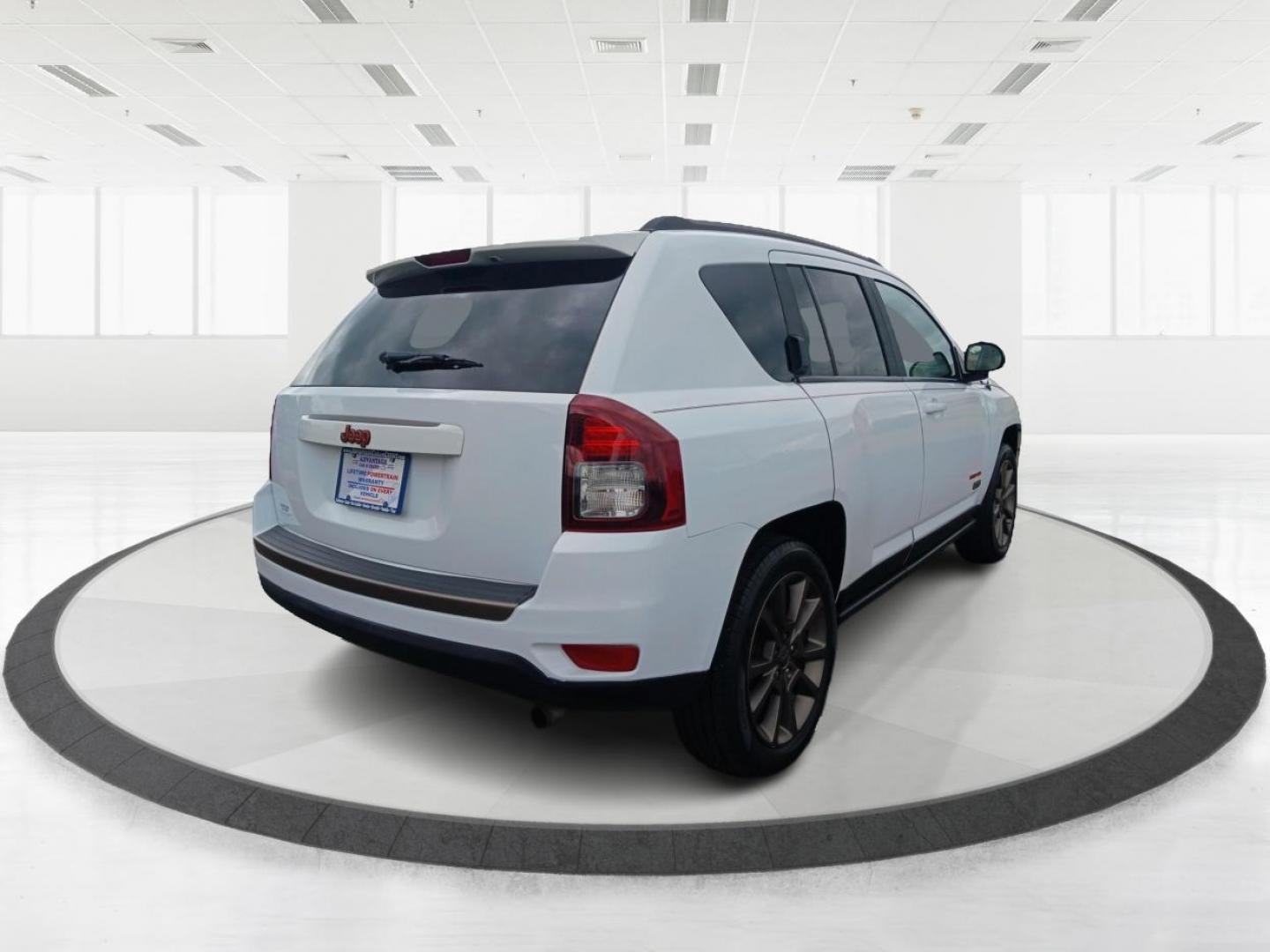 2017 White Knuckle Clear Coat Jeep Compass (1C4NJCBB4HD) with an 2.4L L4 DOHC 16V engine, located at 1184 Kauffman Ave, Fairborn, OH, 45324, (937) 908-9800, 39.807072, -84.030914 - Photo#2