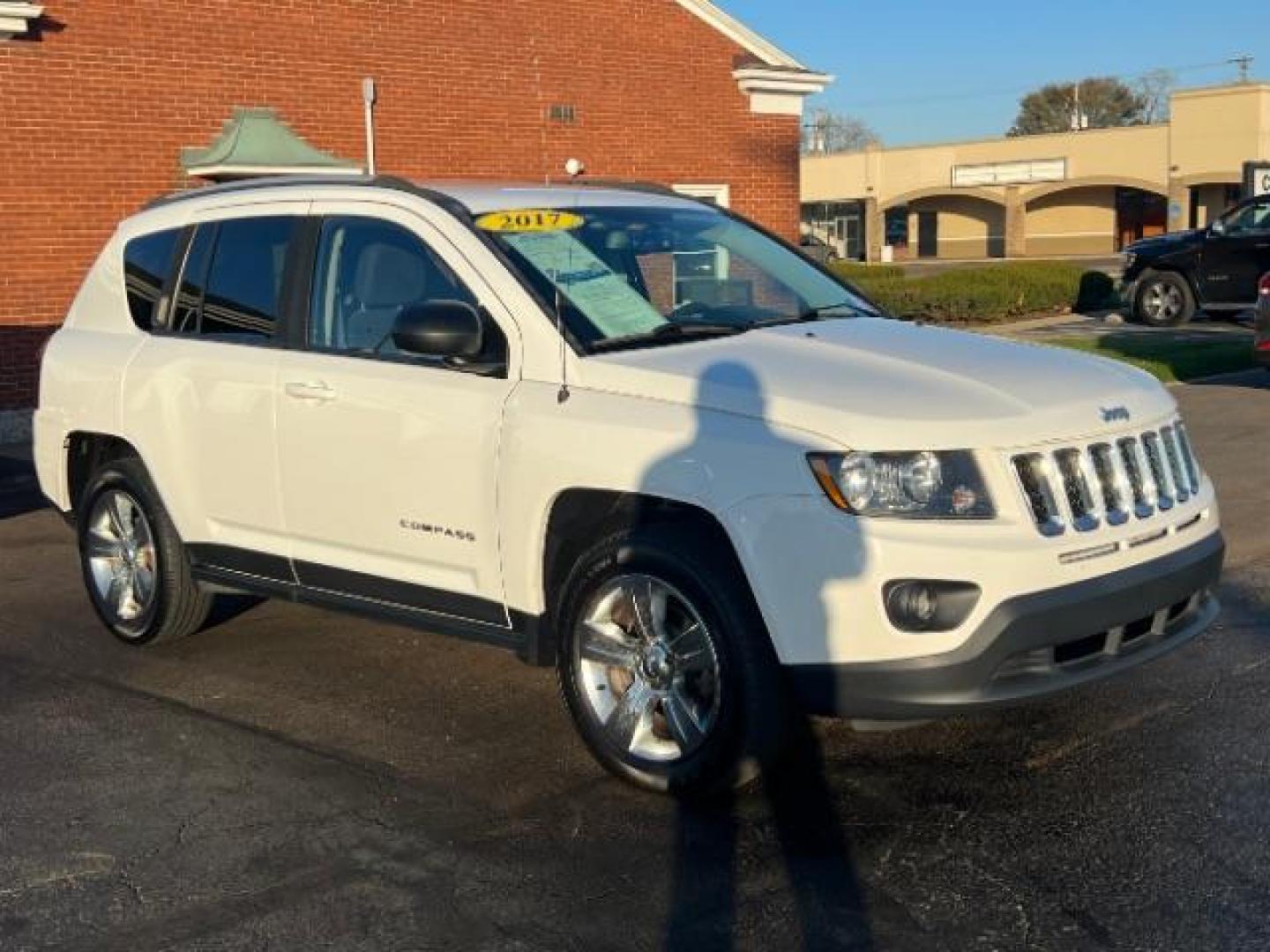 2017 White Knuckle Clear Coat Jeep Compass Sport FWD (1C4NJCBA3HD) with an 2.0L L4 DOHC 16V engine, located at 4508 South Dixie Dr, Moraine, OH, 45439, (937) 908-9800, 39.689976, -84.218452 - Photo#0