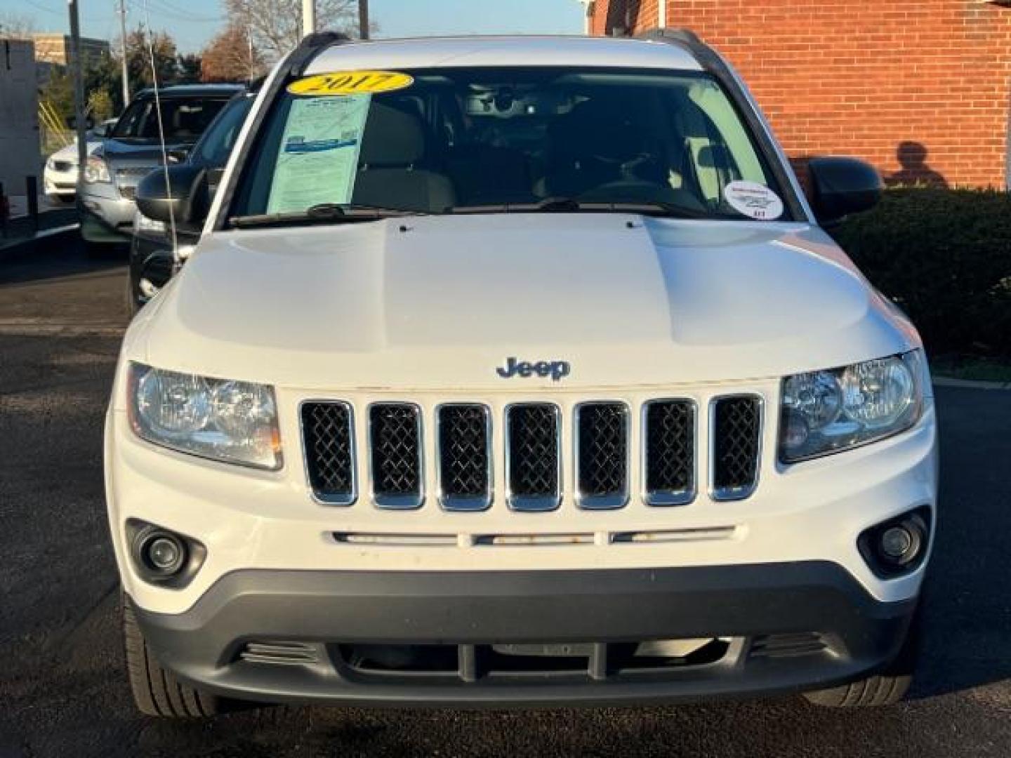 2017 White Knuckle Clear Coat Jeep Compass Sport FWD (1C4NJCBA3HD) with an 2.0L L4 DOHC 16V engine, located at 4508 South Dixie Dr, Moraine, OH, 45439, (937) 908-9800, 39.689976, -84.218452 - Photo#1