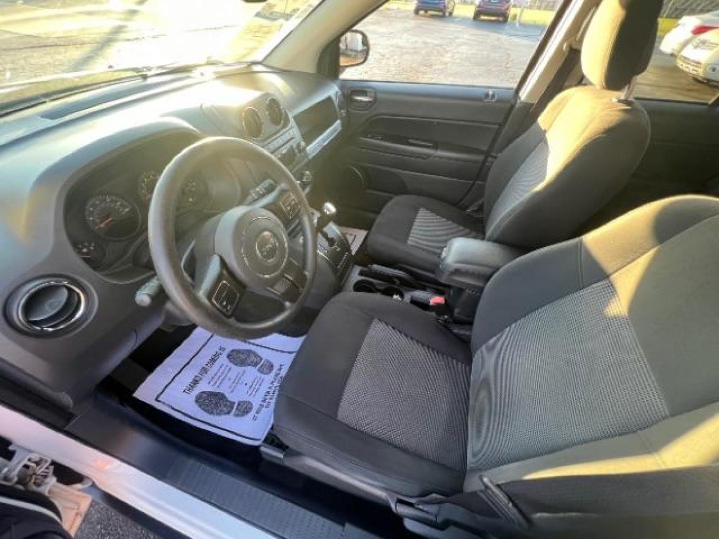 2017 White Knuckle Clear Coat Jeep Compass Sport FWD (1C4NJCBA3HD) with an 2.0L L4 DOHC 16V engine, located at 4508 South Dixie Dr, Moraine, OH, 45439, (937) 908-9800, 39.689976, -84.218452 - Photo#6