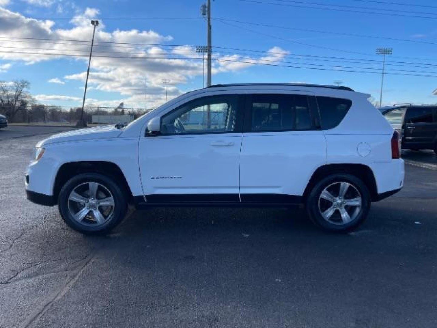 2017 White Knuckle Clear Coat Jeep Compass Latitude 4WD (1C4NJDEB8HD) with an 2.4L L4 DOHC 16V engine, 6-Speed Automatic transmission, located at 1184 Kauffman Ave, Fairborn, OH, 45324, (937) 908-9800, 39.807072, -84.030914 - Photo#2