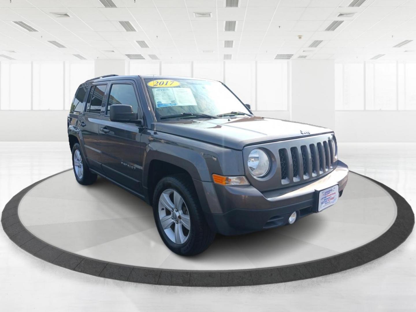 2017 Granite Metallic Clear Coat Jeep Patriot (1C4NJRFB1HD) with an 2.4L L4 DOHC 16V engine, located at 1230 East Main St, Xenia, OH, 45385, (937) 908-9800, 39.688026, -83.910172 - Photo#0