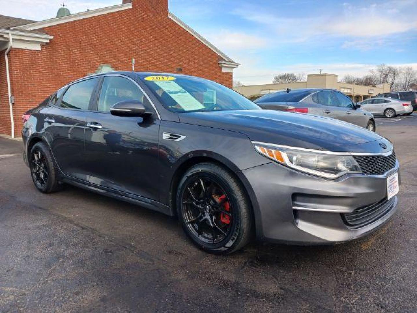 2017 Platinum Graphite Kia Optima LX (5XXGT4L31HG) with an 2.4L L4 DOHC 16V engine, 6-Speed Automatic transmission, located at 1099 N County Rd 25A, Troy, OH, 45373, (937) 908-9800, 40.057079, -84.212883 - Photo#0