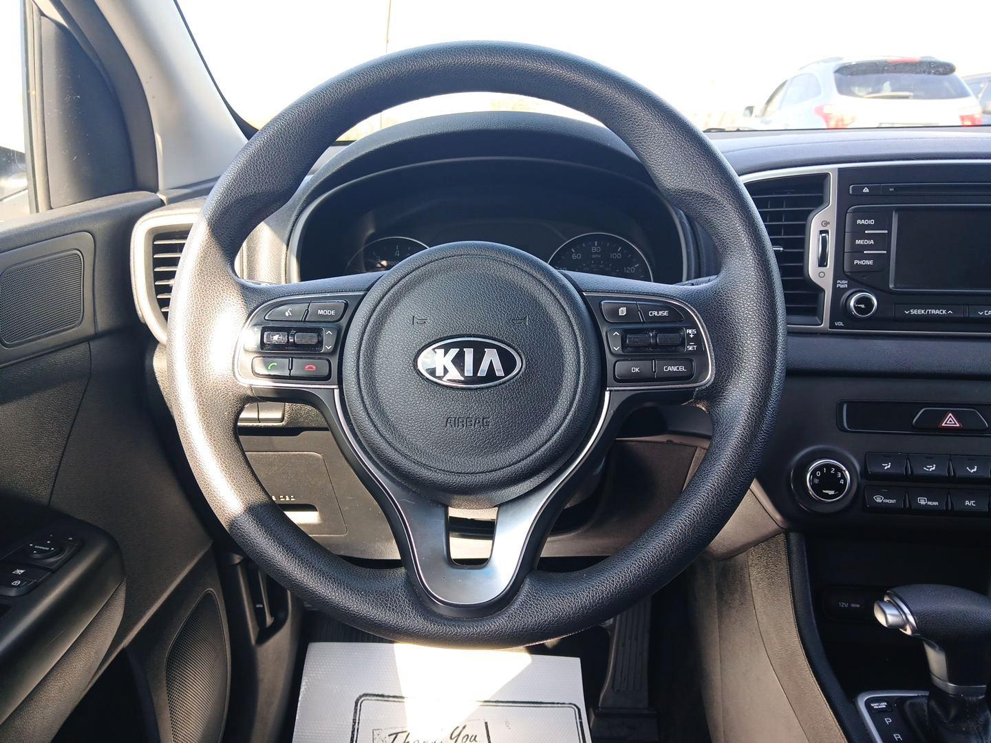 2017 Clear White Kia Sportage (KNDPMCAC6H7) with an 2.4L V6 DOHC 24V engine, 6-Speed Automatic transmission, located at 1184 Kauffman Ave, Fairborn, OH, 45324, (937) 908-9800, 39.807072, -84.030914 - Photo#15