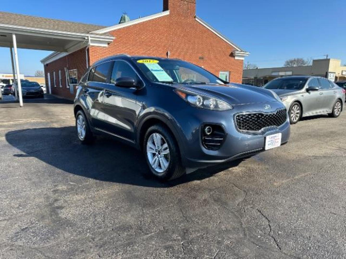 2017 Pacific Blue Kia Sportage LX AWD (KNDPMCAC6H7) with an 2.4L V6 DOHC 24V engine, 6-Speed Automatic transmission, located at 4508 South Dixie Dr, Moraine, OH, 45439, (937) 908-9800, 39.689976, -84.218452 - Photo#0