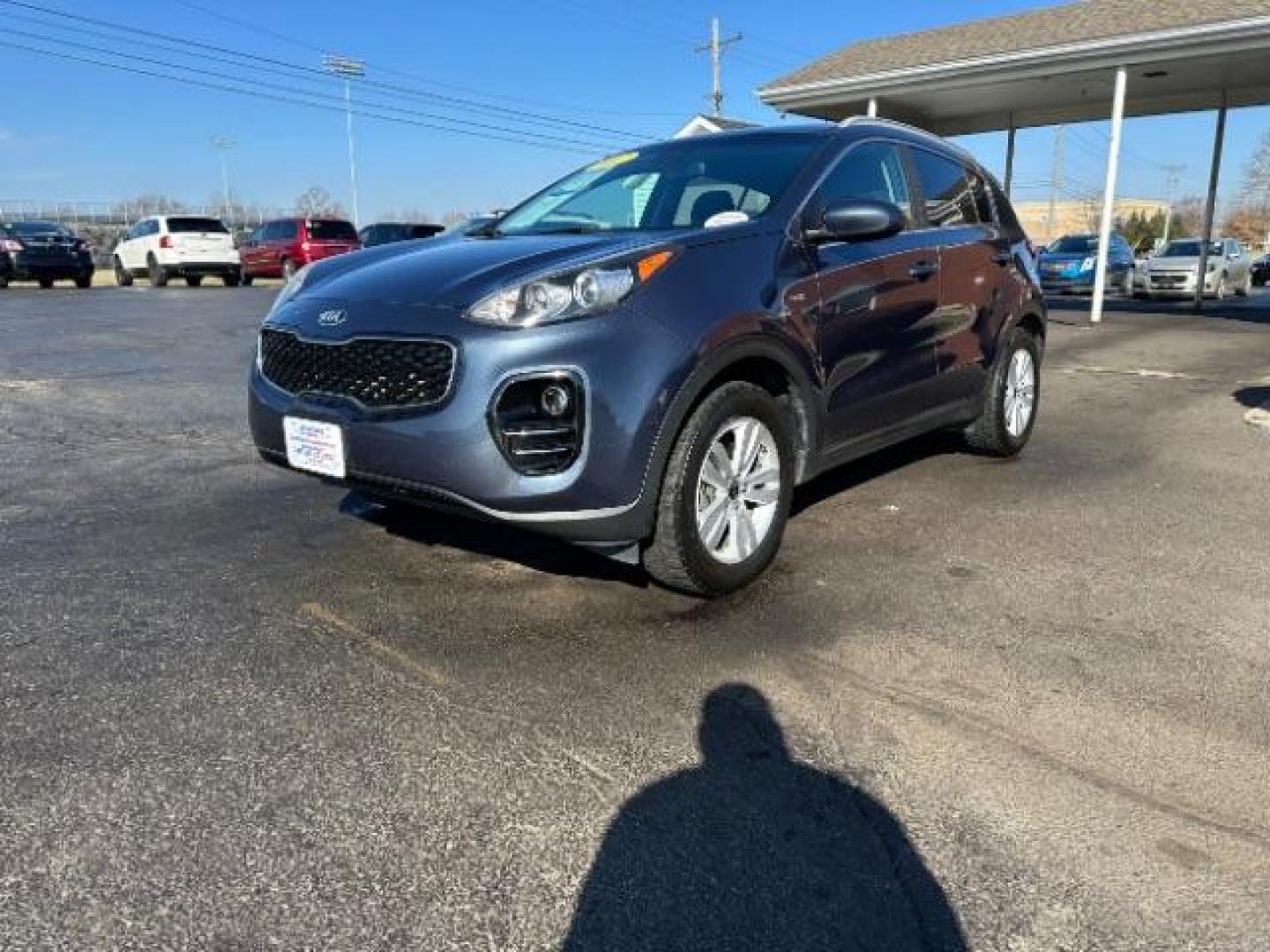 2017 Pacific Blue Kia Sportage LX AWD (KNDPMCAC6H7) with an 2.4L V6 DOHC 24V engine, 6-Speed Automatic transmission, located at 4508 South Dixie Dr, Moraine, OH, 45439, (937) 908-9800, 39.689976, -84.218452 - Photo#2