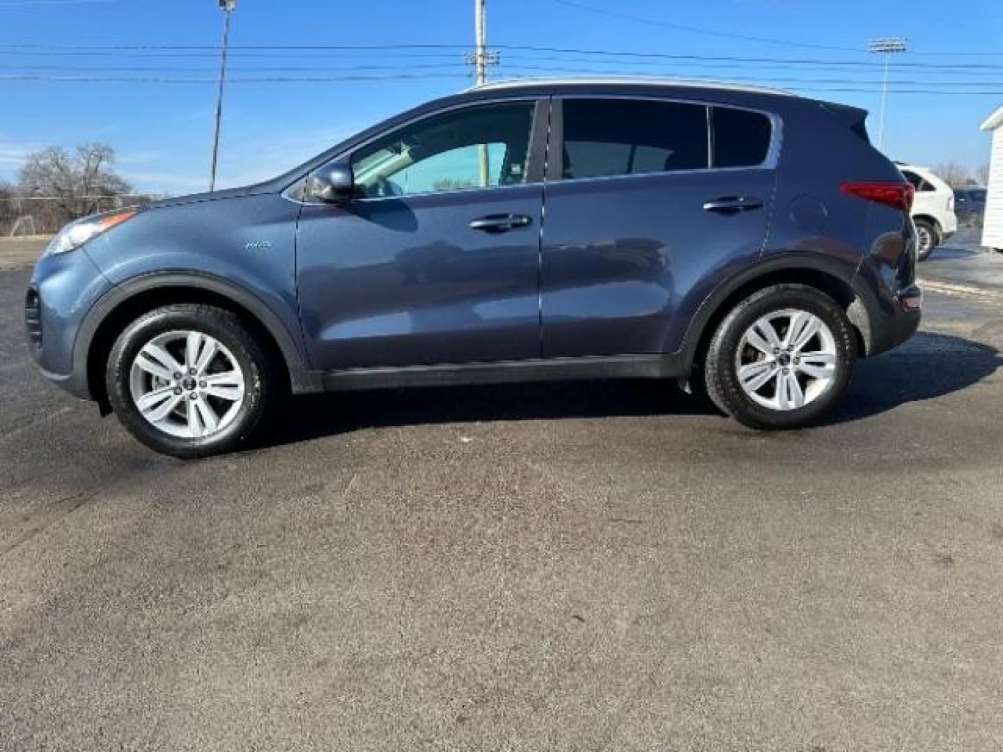 2017 Pacific Blue Kia Sportage LX AWD (KNDPMCAC6H7) with an 2.4L V6 DOHC 24V engine, 6-Speed Automatic transmission, located at 4508 South Dixie Dr, Moraine, OH, 45439, (937) 908-9800, 39.689976, -84.218452 - Photo#3