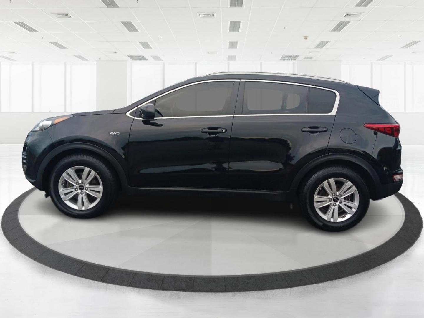 2017 Black Cherry Kia Sportage (KNDPMCAC8H7) with an 2.4L V6 DOHC 24V engine, 6-Speed Automatic transmission, located at 1951 S Dayton Lakeview Rd., New Carlisle, OH, 45344, (937) 908-9800, 39.890999, -84.050255 - Photo#5