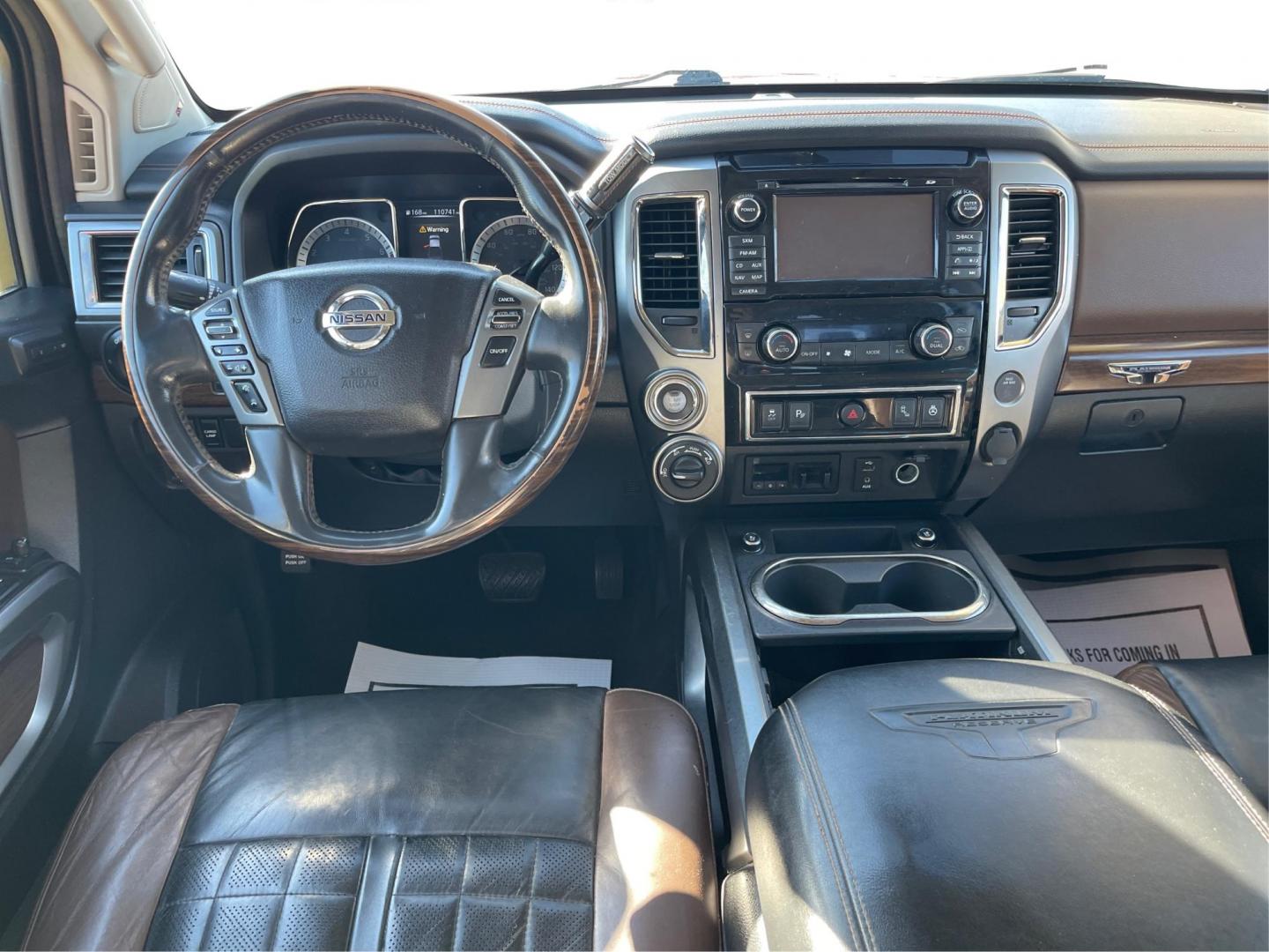 2017 Cayenne Red Nissan Titan Platinum Reserve Crew Cab 4WD (1N6AA1E53HN) with an 5.6L V8 DOHC 32V engine, 6A transmission, located at 1184 Kauffman Ave, Fairborn, OH, 45324, (937) 908-9800, 39.807072, -84.030914 - Photo#20