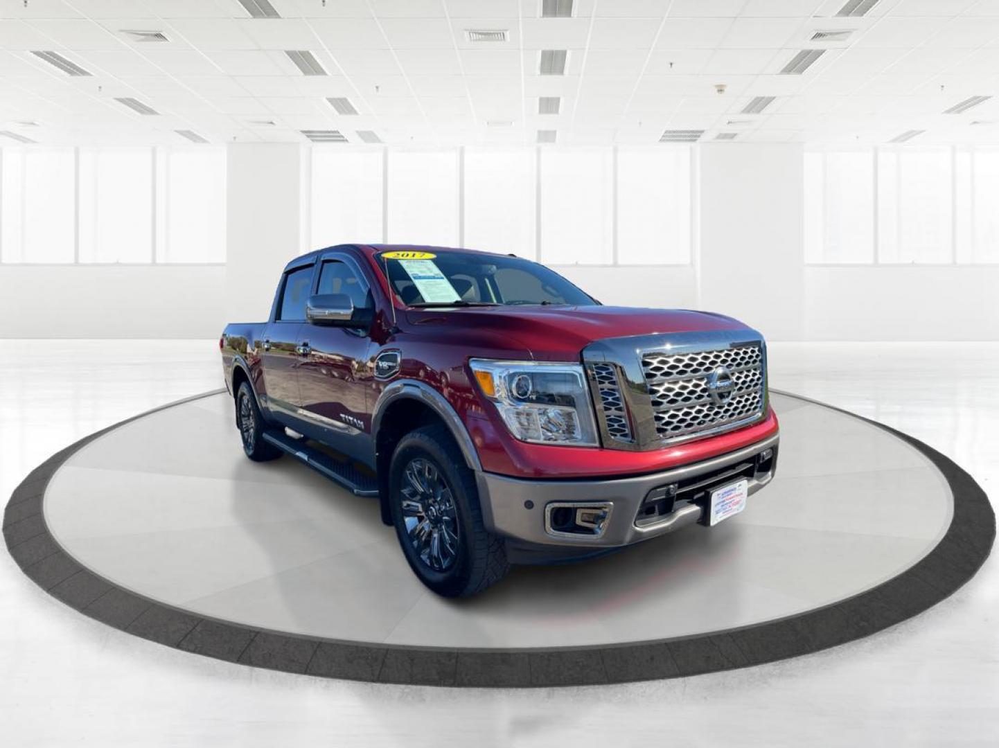 2017 Nissan Titan Platinum Reserve Crew Cab 4WD (1N6AA1E53HN) with an 5.6L V8 DOHC 32V engine, 6-Speed Automatic transmission, located at 1184 Kauffman Ave, Fairborn, OH, 45324, (937) 908-9800, 39.807072, -84.030914 - 2017 Nissan Titan Platinum Reserve Crew Cab 4WD - Photo#0