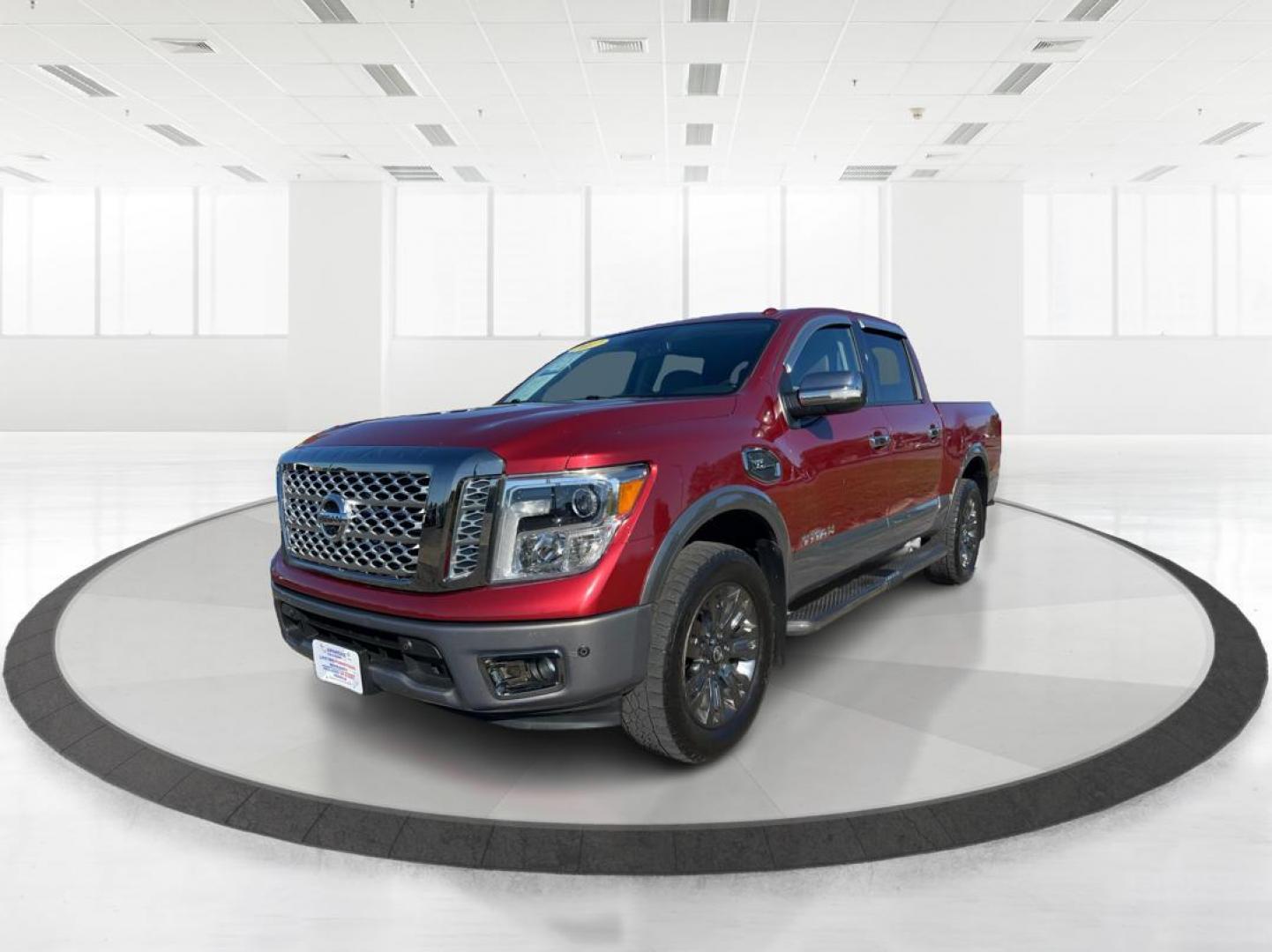 2017 Nissan Titan Platinum Reserve Crew Cab 4WD (1N6AA1E53HN) with an 5.6L V8 DOHC 32V engine, 6-Speed Automatic transmission, located at 1184 Kauffman Ave, Fairborn, OH, 45324, (937) 908-9800, 39.807072, -84.030914 - 2017 Nissan Titan Platinum Reserve Crew Cab 4WD - Photo#7