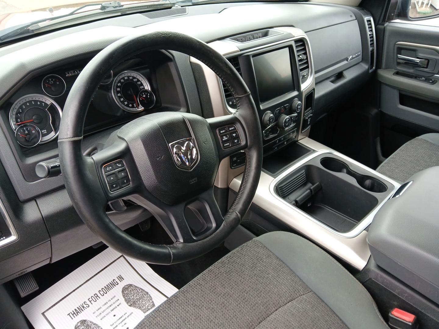 2017 Delmonico Red Pearl Coat RAM 1500 SLT Crew Cab SWB 4WD (3C6RR7LT1HG) with an 5.7L V8 OHV 16V engine, 8A transmission, located at 880 E. National Road, Vandalia, OH, 45377, (937) 908-9800, 39.891918, -84.183594 - Photo#8