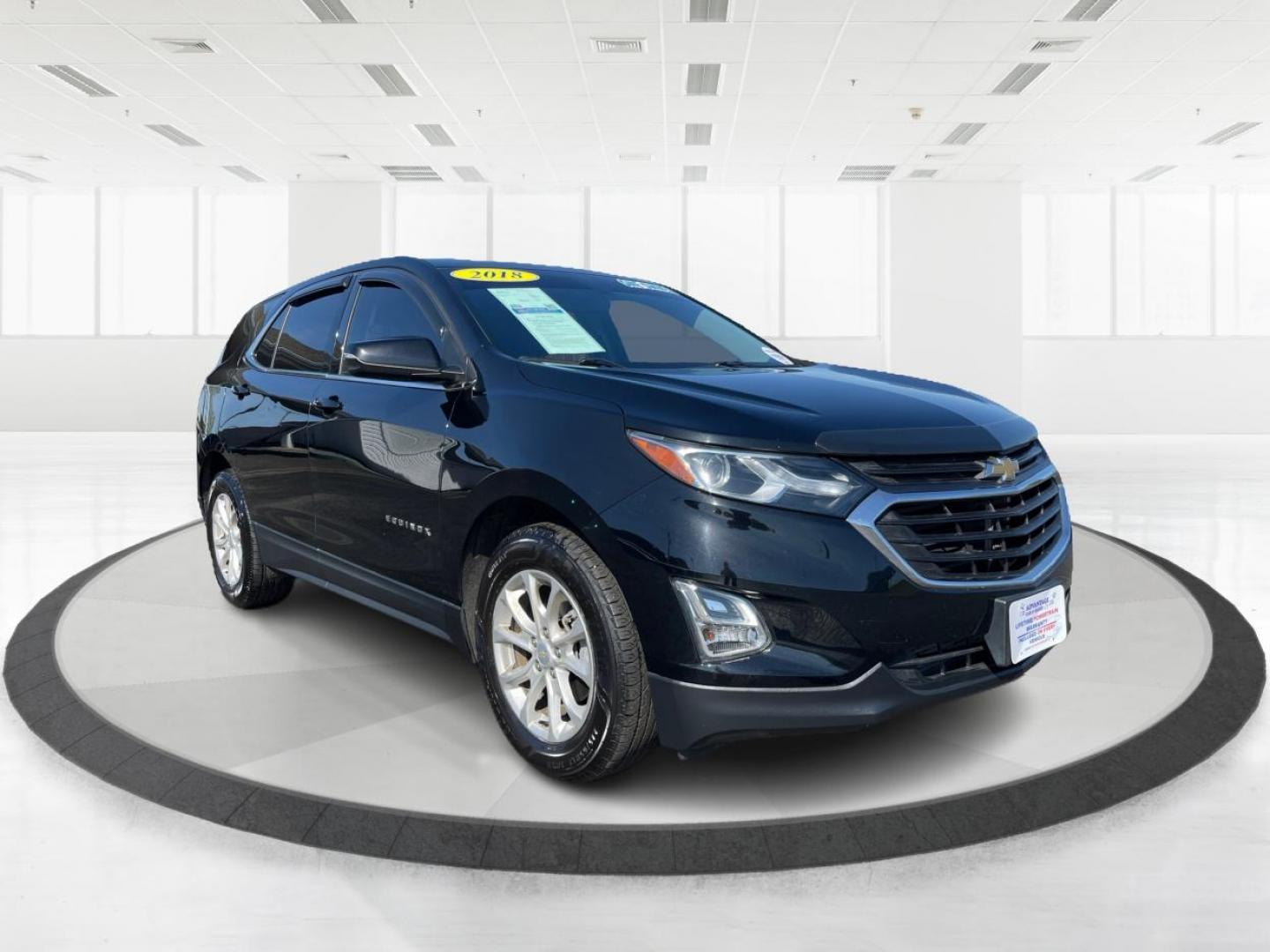 2018 Mosaic Black Metallic Chevrolet Equinox (2GNAXJEV1J6) with an 1.5L L4 DIR DOHC 16V TURBO engine, 6-Speed Automatic transmission, located at 4508 South Dixie Dr, Moraine, OH, 45439, (937) 908-9800, 39.689976, -84.218452 - Photo#0