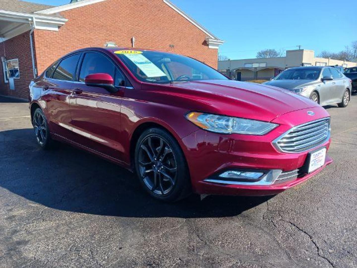 2018 Burgundy Velvet Metallic Tinted Clearcoat Ford Fusion SE (3FA6P0HDXJR) with an 1.5L L4 DOHC 16V engine, 6-Speed Automatic transmission, located at 1230 East Main St, Xenia, OH, 45385, (937) 908-9800, 39.688026, -83.910172 - Photo#0