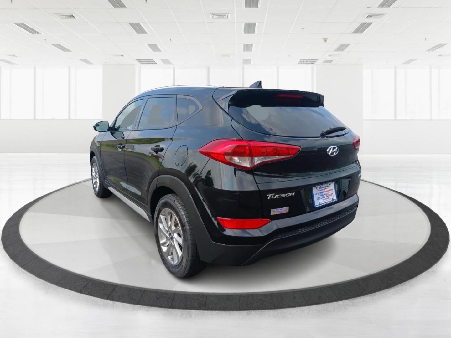 2018 Black Noir Pearl Hyundai Tucson SEL AWD (KM8J3CA40JU) with an 2.0L L4 DOHC 16V engine, 6-Speed Automatic transmission, located at 1184 Kauffman Ave, Fairborn, OH, 45324, (937) 908-9800, 39.807072, -84.030914 - Photo#4