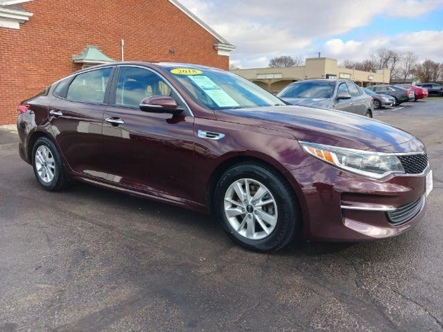 2018 Sangria Kia Optima LX (5XXGT4L34JG) with an 2.4L L4 DOHC 16V engine, 6-Speed Automatic transmission, located at 4508 South Dixie Dr, Moraine, OH, 45439, (937) 908-9800, 39.689976, -84.218452 - Photo#0