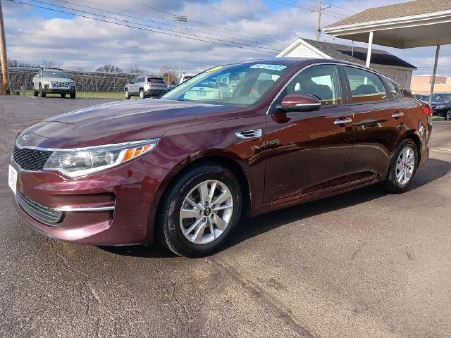 2018 Sangria Kia Optima LX (5XXGT4L34JG) with an 2.4L L4 DOHC 16V engine, 6-Speed Automatic transmission, located at 4508 South Dixie Dr, Moraine, OH, 45439, (937) 908-9800, 39.689976, -84.218452 - Photo#2