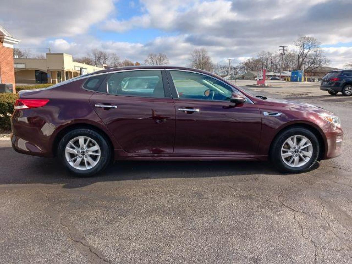 2018 Sangria Kia Optima LX (5XXGT4L34JG) with an 2.4L L4 DOHC 16V engine, 6-Speed Automatic transmission, located at 4508 South Dixie Dr, Moraine, OH, 45439, (937) 908-9800, 39.689976, -84.218452 - Photo#4