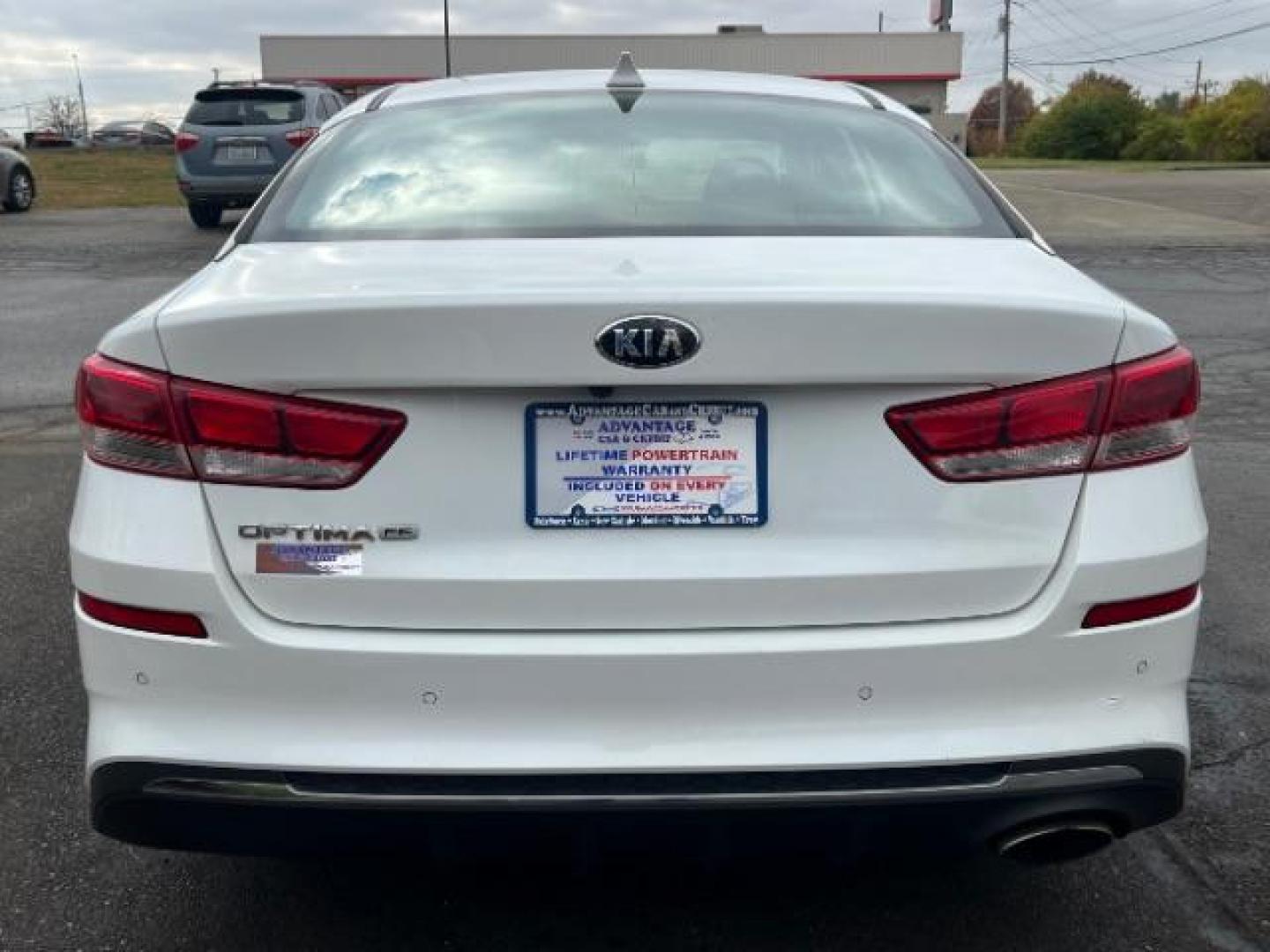 2019 Snow White Pearl Kia Optima LX (5XXGT4L30KG) with an 2.4L L4 DOHC 16V engine, 6-Speed Automatic transmission, located at 880 E. National Road, Vandalia, OH, 45377, (937) 908-9800, 39.891918, -84.183594 - Photo#4