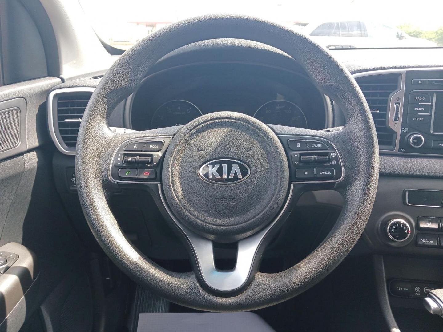 2019 Hyper Red Kia Sportage LX FWD (KNDPM3AC9K7) with an 2.4L V6 DOHC 24V engine, 6-Speed Automatic transmission, located at 1099 N County Rd 25A, Troy, OH, 45373, (937) 908-9800, 40.057079, -84.212883 - Photo#15