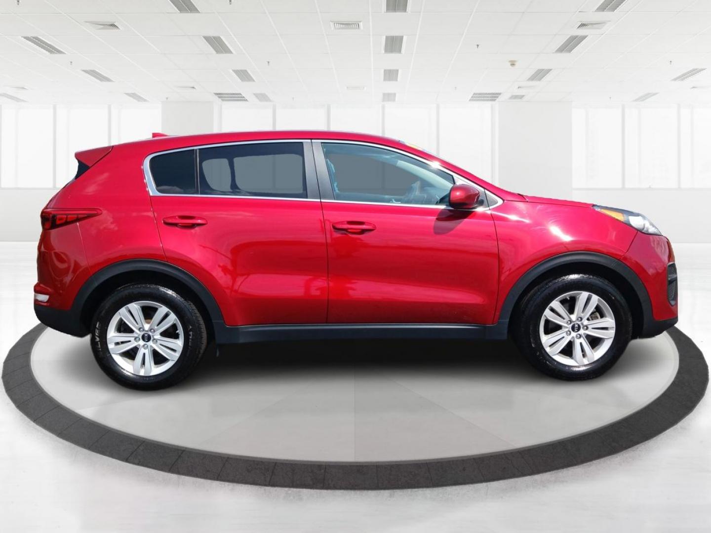 2019 Hyper Red Kia Sportage LX FWD (KNDPM3AC9K7) with an 2.4L V6 DOHC 24V engine, 6-Speed Automatic transmission, located at 1099 N County Rd 25A, Troy, OH, 45373, (937) 908-9800, 40.057079, -84.212883 - Photo#1