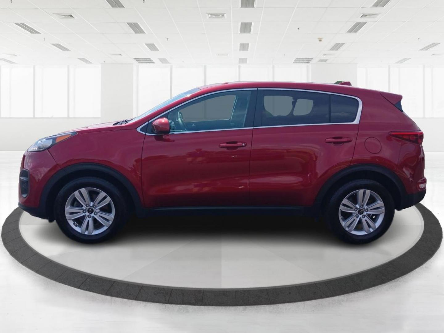 2019 Hyper Red Kia Sportage LX FWD (KNDPM3AC9K7) with an 2.4L V6 DOHC 24V engine, 6-Speed Automatic transmission, located at 1099 N County Rd 25A, Troy, OH, 45373, (937) 908-9800, 40.057079, -84.212883 - Photo#5