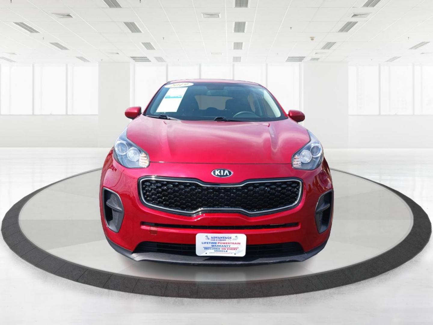 2019 Hyper Red Kia Sportage LX FWD (KNDPM3AC9K7) with an 2.4L V6 DOHC 24V engine, 6-Speed Automatic transmission, located at 1099 N County Rd 25A, Troy, OH, 45373, (937) 908-9800, 40.057079, -84.212883 - Photo#6