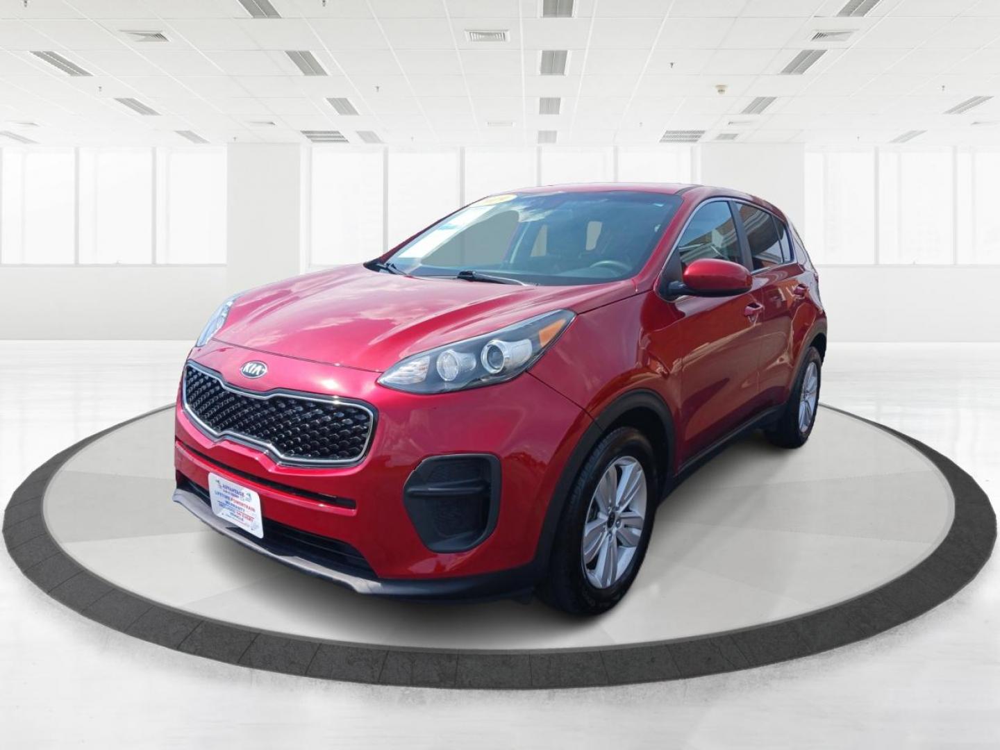 2019 Hyper Red Kia Sportage LX FWD (KNDPM3AC9K7) with an 2.4L V6 DOHC 24V engine, 6-Speed Automatic transmission, located at 1099 N County Rd 25A, Troy, OH, 45373, (937) 908-9800, 40.057079, -84.212883 - Photo#7